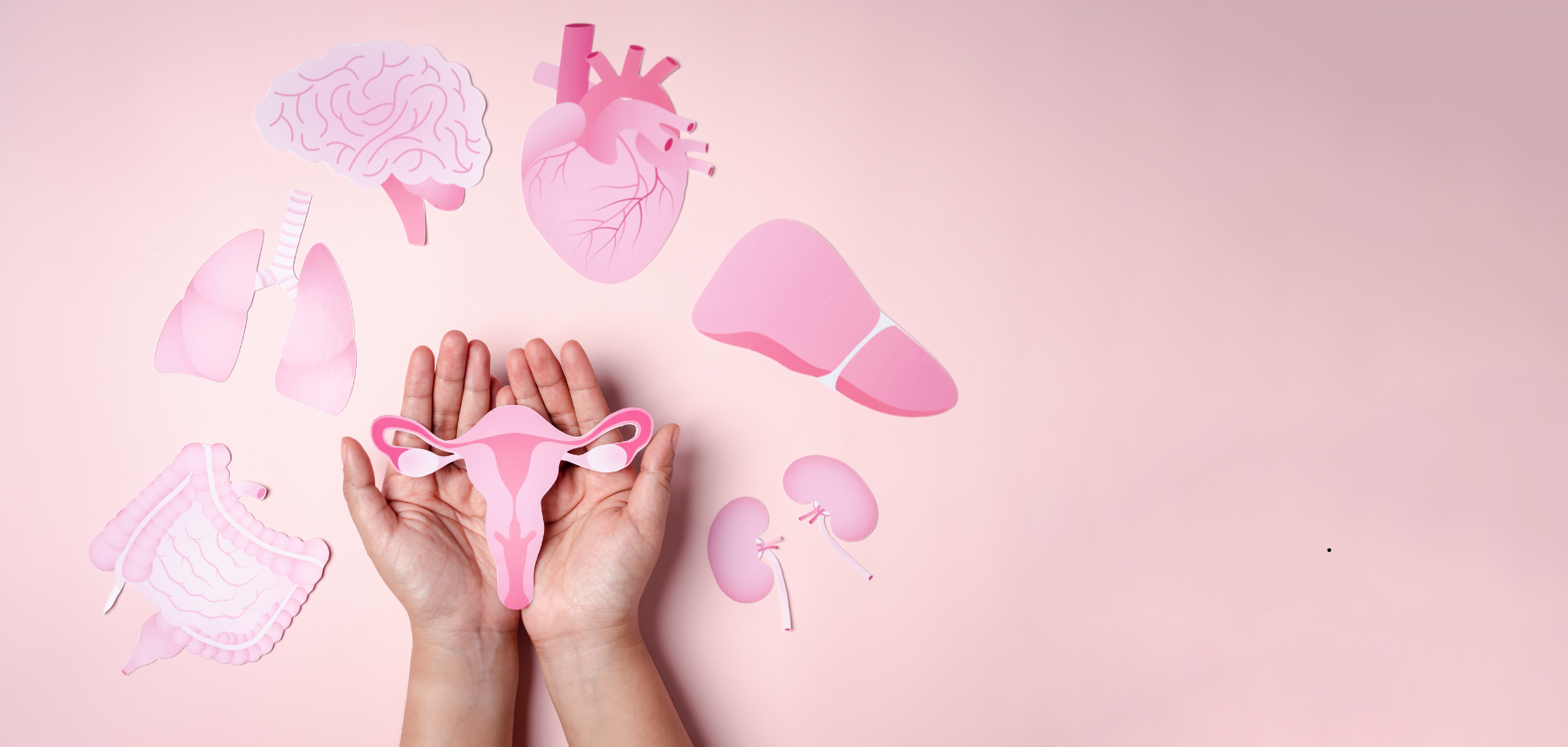 A woman holding a warm mug, looking content